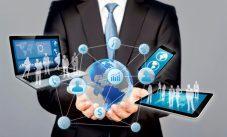 Businessman Holds Modern Technology In Hands